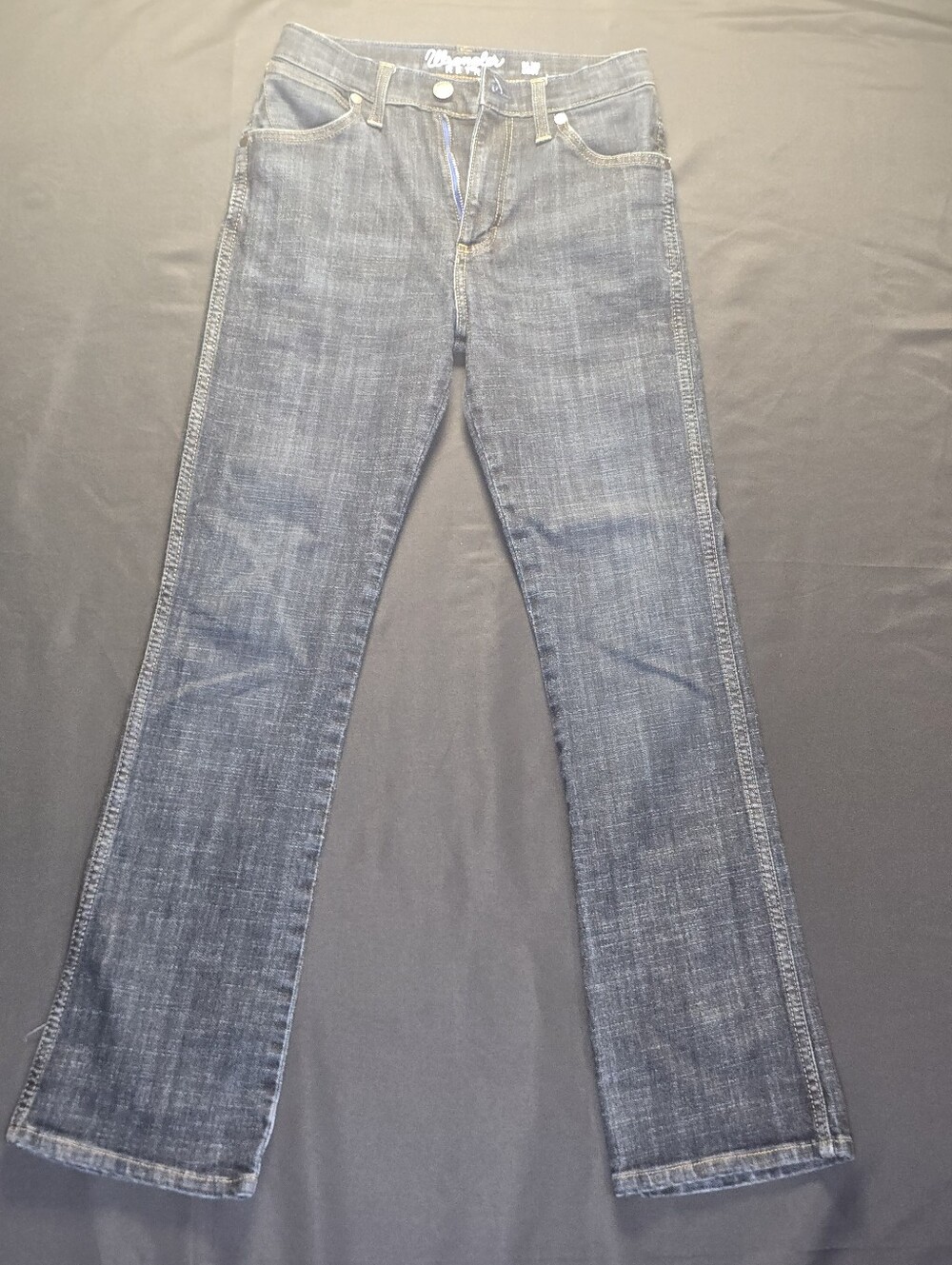 Authentic Wrangler Retro boys dark wash denim jeans. Embrace the ultimate cowboy